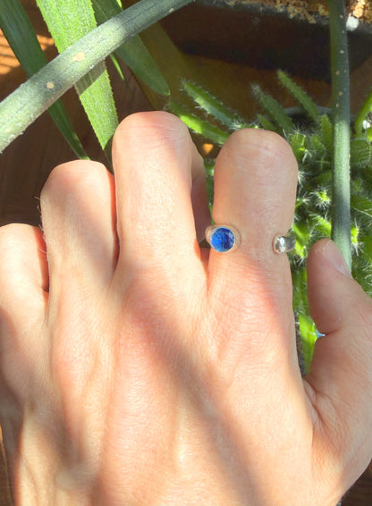 STERLING SILVER RING WITH A NATURAL BLUE TOPAZ